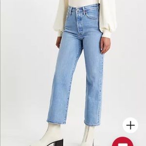 Light wash Levi’s ribcage straight high rise jeans
